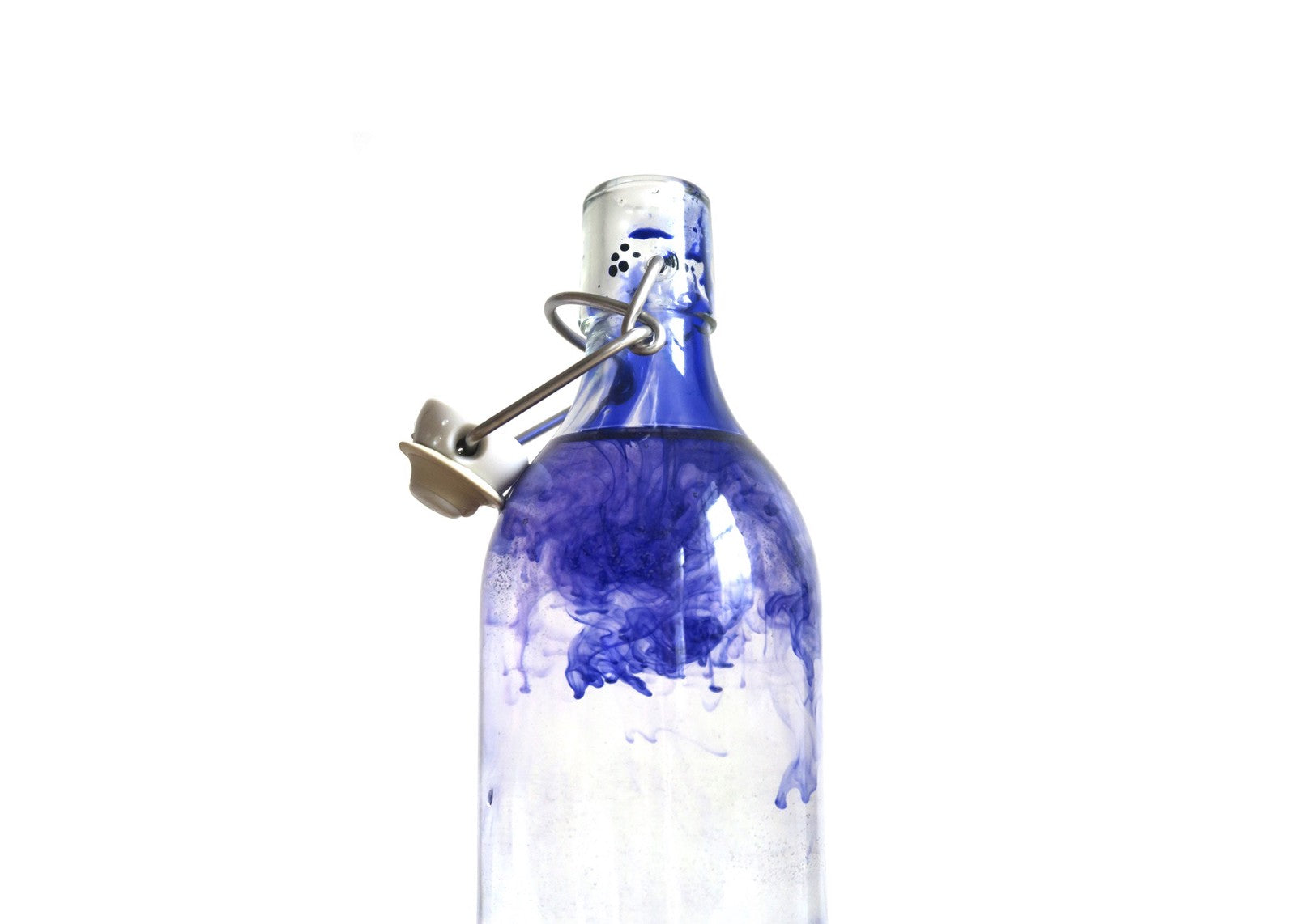 Glass bottle of water Polluted with Ink